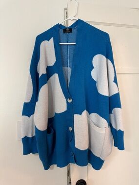 Dressed in LALA Blue and White Cloud-Print Oversized Cardigan
